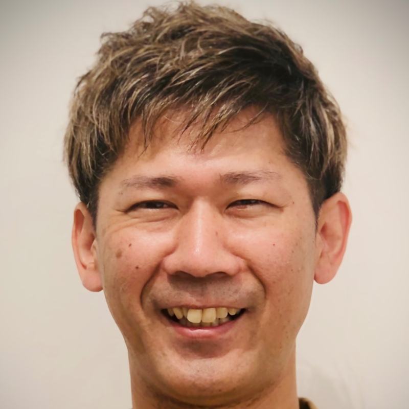 日比野　哲ニ
