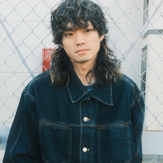 津田 輝