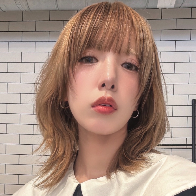 積　彰恵