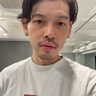 角田 英次